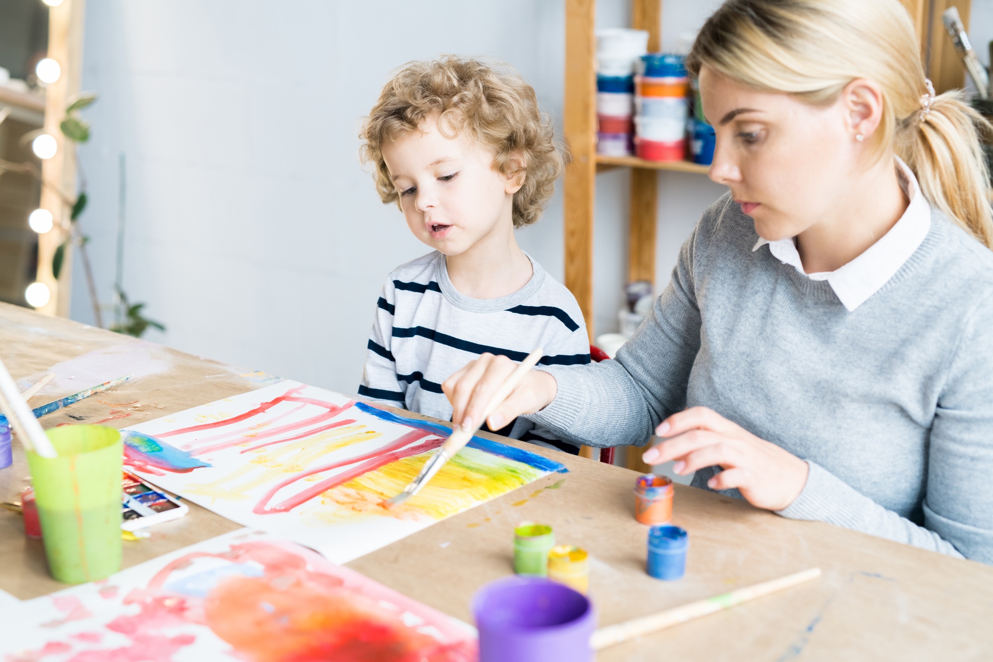 Drawing together with teacher