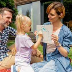 Family play together and spending joyful moments in backyard