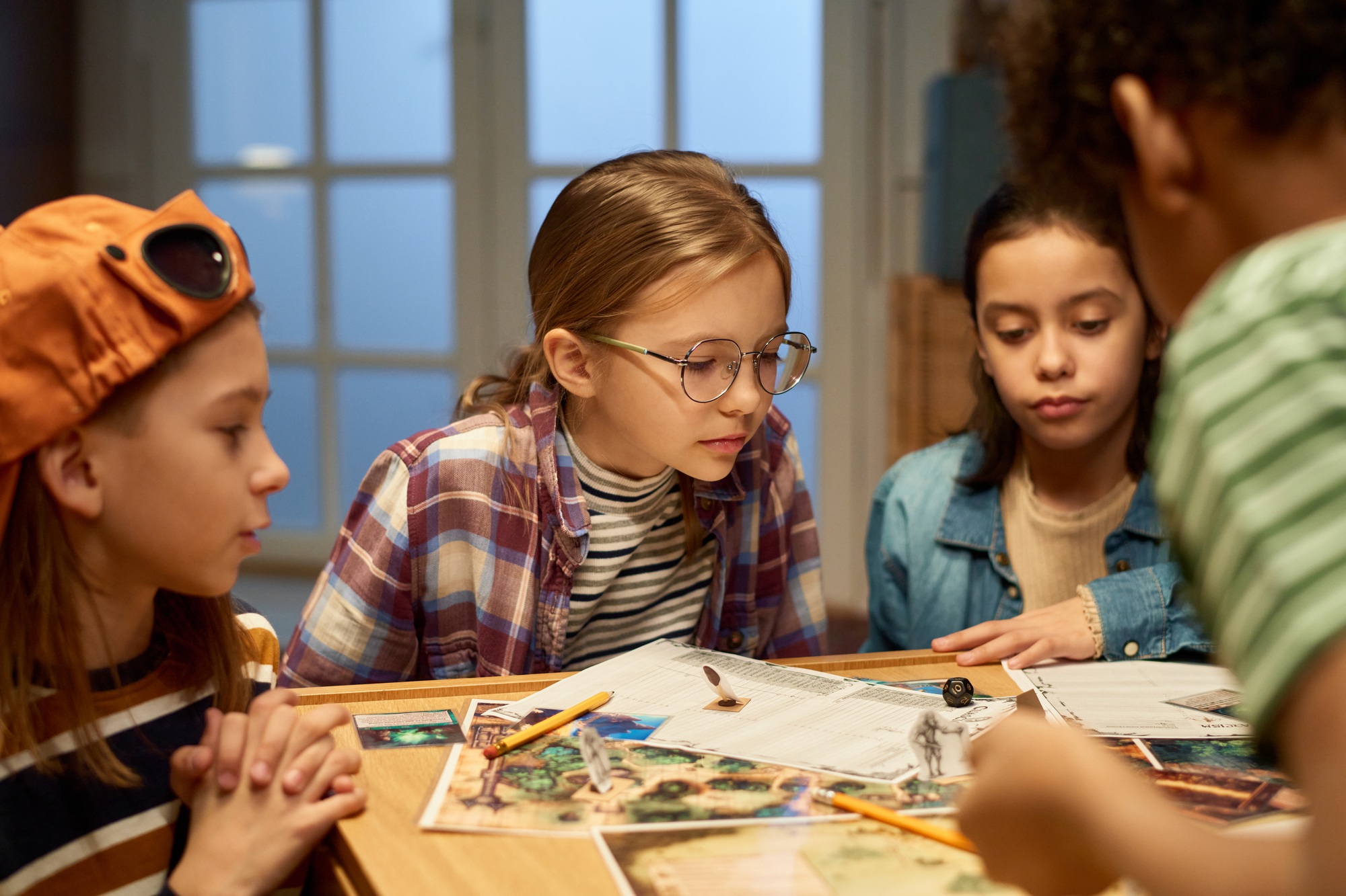 Looking at dice thrown by one of friends