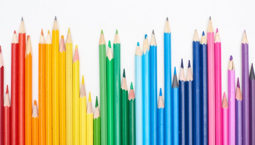 Rainbow spectrum made with color pencils isolated on white